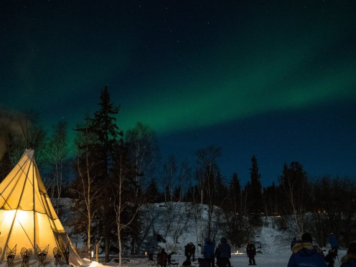 Visitors viewing the aurora near Yellowknife